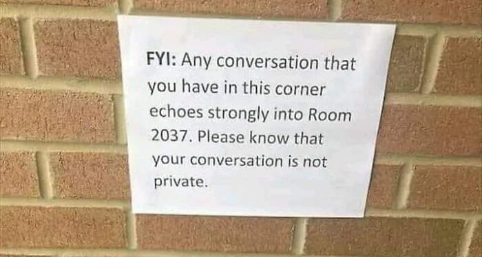 Sign on brick wall warning conversations echo into Room 2037, indicating lack of privacy. Sign on brick wall warning conversations echo into Room 2037, indicating lack of privacy.